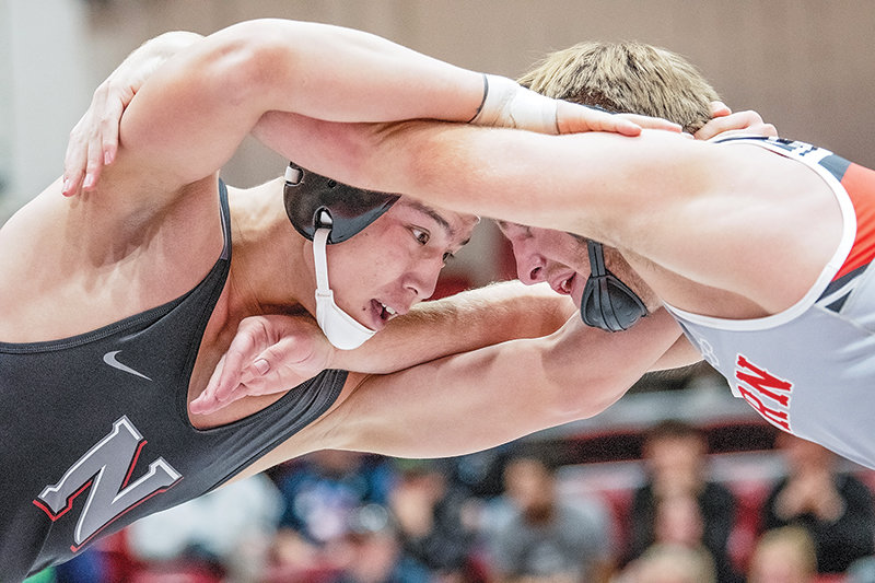 Aziz Fayzullaev (left) battles with Western Wyoming’s Christian Smoot during the Joe Mickelson Memorial Wrestling Open in November. Fayzullaev defeated Smoot in a No. 1 vs No. 2 matchup on Friday in a dual in Rock Springs.
TRIBUNE PHOTO BY CARLA WENSKY