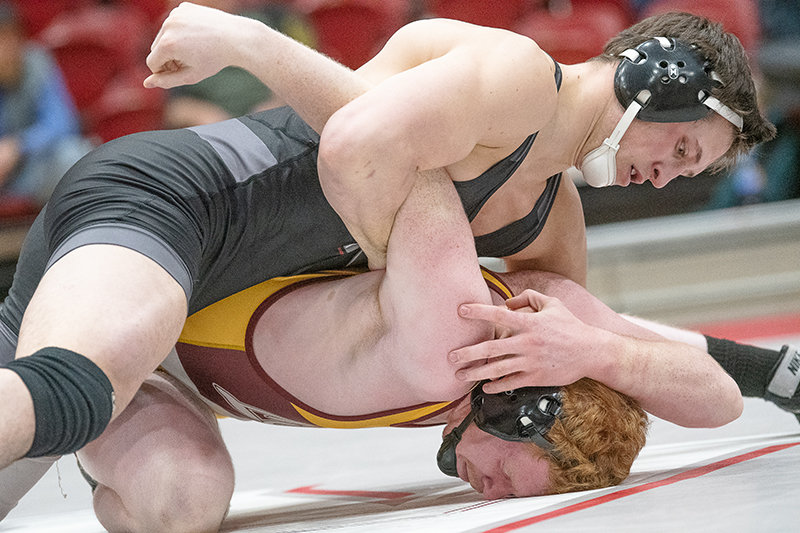Ryker Blackburn pins down his opponent during a dual with MSU-Northern on Jan. 10.
TRIBUNE PHOTO BY CARLA WENSKY