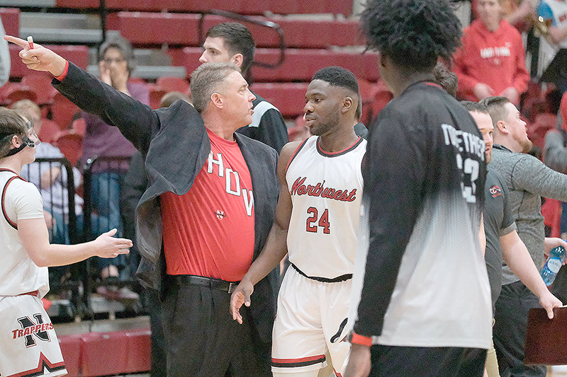 Northwest College men’s coach Andy Ward directs his players towards the locker room after a scuffle broke out immediately following the Northwest vs Casper College game on Saturday.
TRIBUNE PHOTO BY SETH ROMSA
