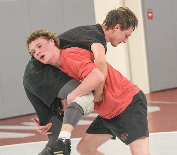 Kendell Cummings (right) and Brady Lowry have both been recovering from a bear attack in October, with Lowry set to return for the Trappers this weekend at the Apodaca Duals.
TRIBUNE PHOTO BY SETH ROMSA