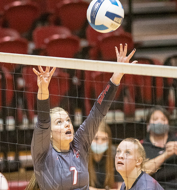 Northwest College freshman Jacie Walker sets a ball Saturday against Laramie County Community College as Sabree Adams watches. The Trappers fell in five sets after leading 2-1.
TRIBUNE PHOTO BY CARSON FIELD