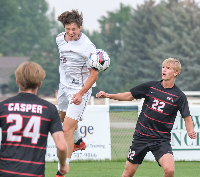 Center back Mason Dykes heads the ball out of the box during the second half against Casper College on Tuesday.
TRIBUNE PHOTO BY SETH ROMSA
