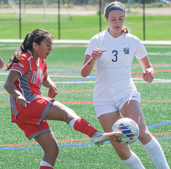 NWC freshman midfielder Alexzia Garcia tries to tap the ball around a charging Montana State University Billings defender during an early season exhibition match.
TRIBUNE PHOTO BY SETH ROMSA